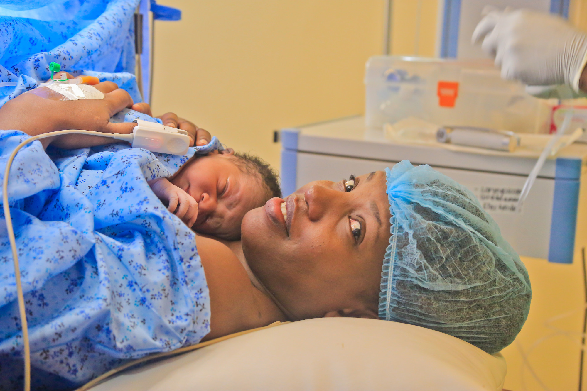woman with child after giving birth